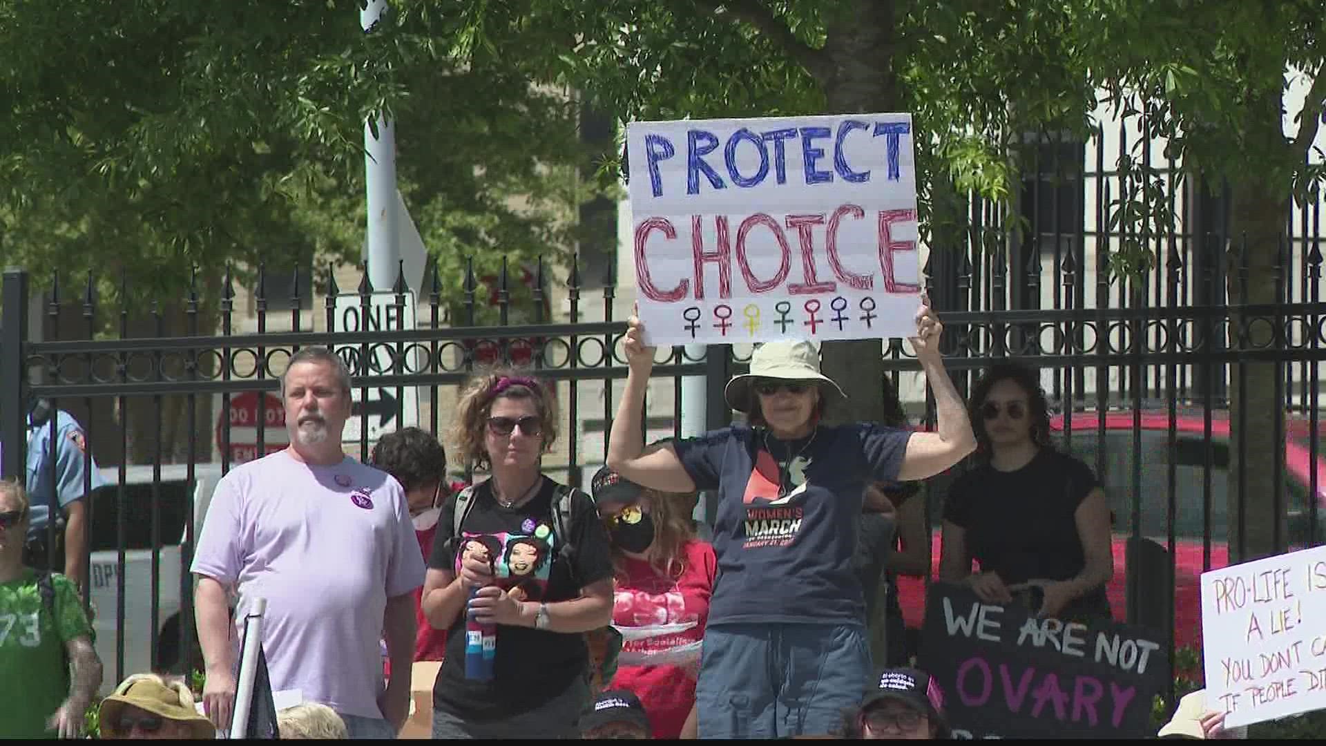 Abortion rights backers took to the streets in anger Saturday over the possible overturning of the landmark ruling.